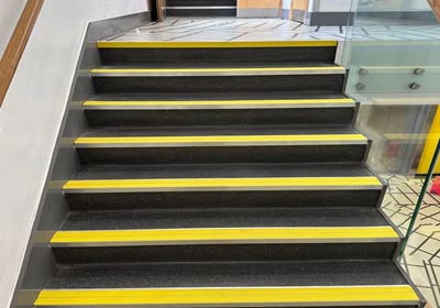 Different types of commercial stair nosings made from aluminium, PVC, and rubber