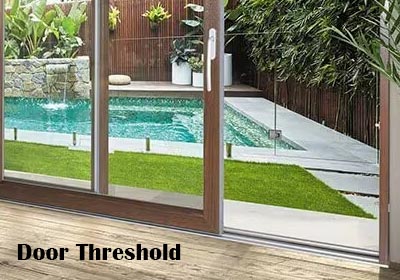 Close-up of a modern door threshold providing protection and insulation